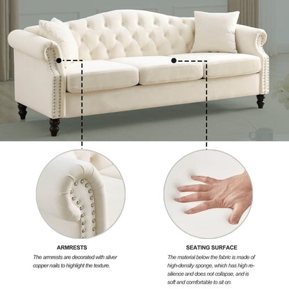 Canapé Chesterfield 3 places capitonné avec accoudoirs roulés et clous décoratifs