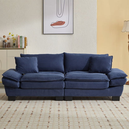 Canapé à assise profonde rembourré en velours côtelé