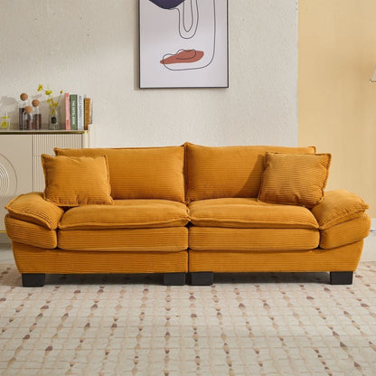 Canapé à assise profonde rembourré en velours côtelé