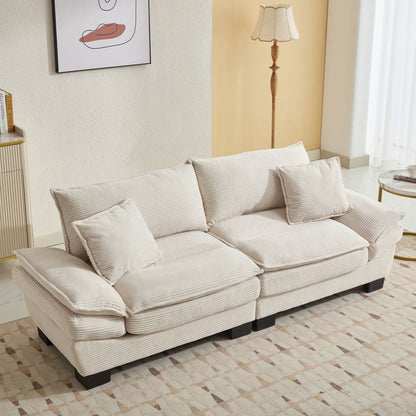 Canapé à assise profonde rembourré en velours côtelé