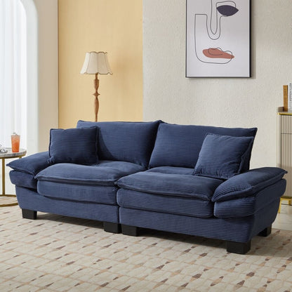 Canapé à assise profonde rembourré en velours côtelé