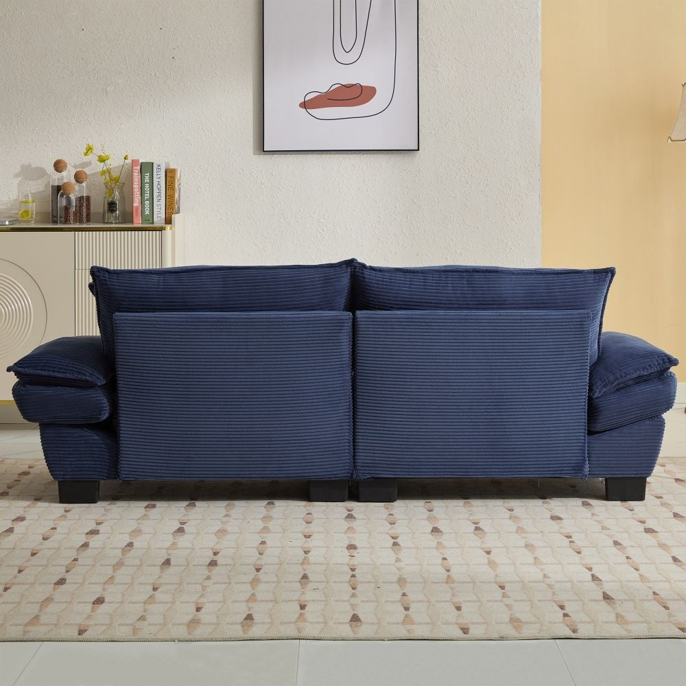 Canapé à assise profonde rembourré en velours côtelé