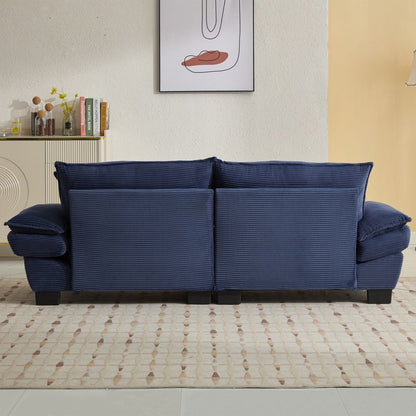 Canapé à assise profonde rembourré en velours côtelé