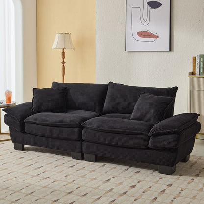 Canapé à assise profonde rembourré en velours côtelé