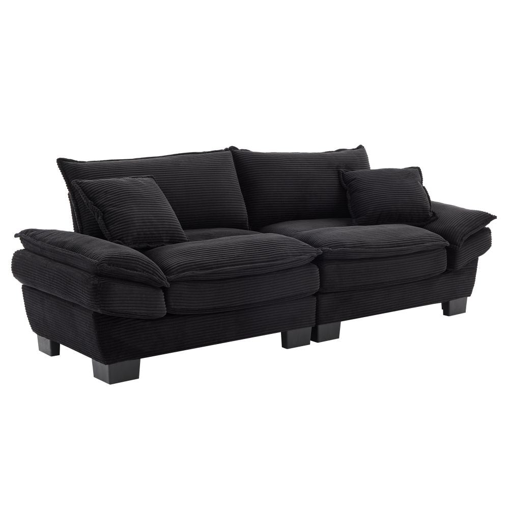 Canapé à assise profonde rembourré en velours côtelé
