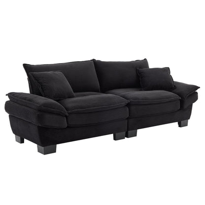 Canapé à assise profonde rembourré en velours côtelé