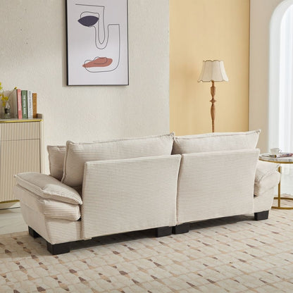 Canapé à assise profonde rembourré en velours côtelé