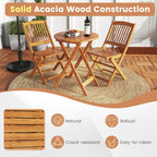 Ensemble bistrot de patio Costway 3 pièces en bois d'acacia avec table et chaises pliantes - Voir les détails