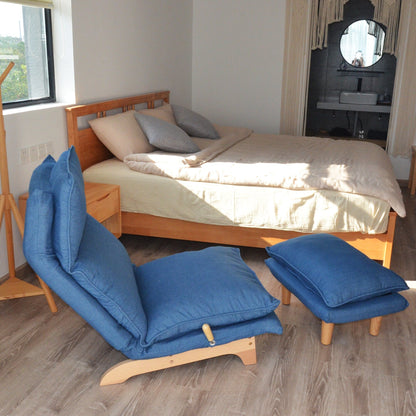 Fauteuil inclinable manuel sans accoudoirs rembourré bleu foncé avec pouf, appui-tête et dossier réglables, position à plat à 180°