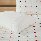 Parure de lit en jacquard de coton à pompons Ensley pour enfants au design intelligent avec coussins décoratifs