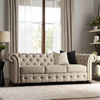 Canapé Chesterfield capitonné à accoudoirs en volutes Gdansk