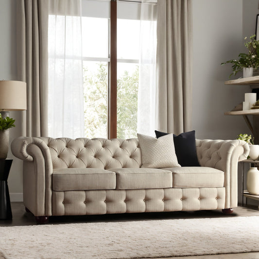 Canapé Chesterfield capitonné à accoudoirs en volutes Gdansk