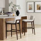 Tabouret de bar moderne Gracie, chaise rembourrée en boucle et pieds en bois brossé