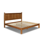 Lit plateforme en bois massif de style shaker avec meubles en bois de grain