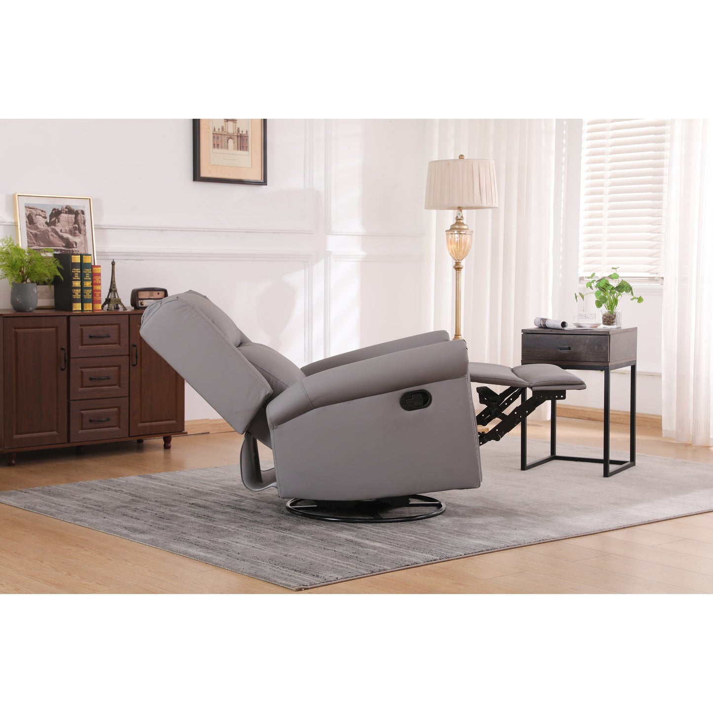 Fauteuil inclinable manuel pivotant à 360° en cuir synthétique gris avec dossier et repose-pieds réglables, décoration cloutée