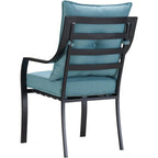 Ensemble de salle à manger Hanover Lavallette 5 pièces bleu océan avec 4 chaises fixes, une table ronde en verre de 132 cm, un parasol et un socle.