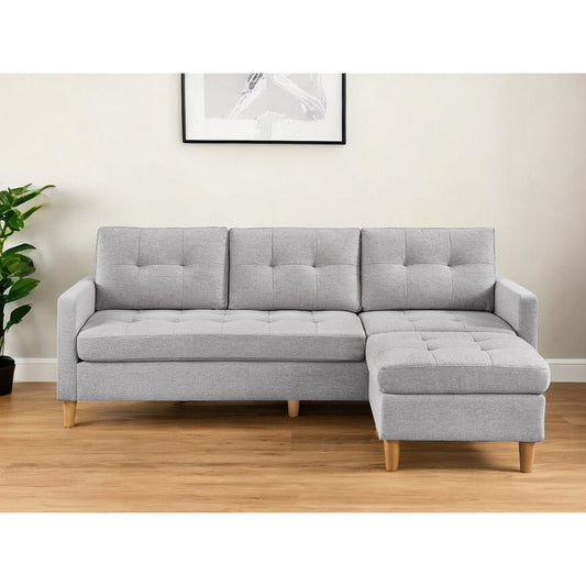 Canapé HomeRoots 87 en polyester gris clair avec pouf et pieds naturels - 87