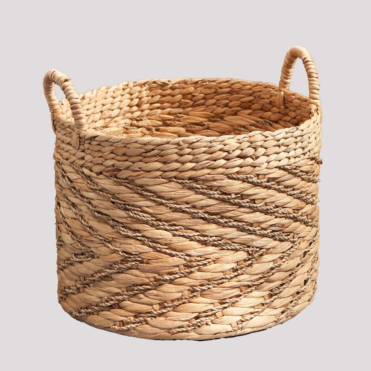 Panier rond tissé en jonc de mer et jacinthe d'eau Isidore pour le rangement de la maison