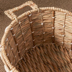 Panier rond tissé en jonc de mer et jacinthe d'eau Isidore pour le rangement de la maison