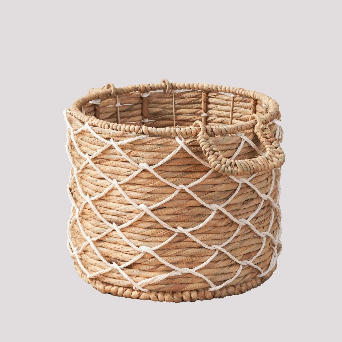 Panier rond tissé en jonc de mer et jacinthe d'eau Isidore pour le rangement de la maison