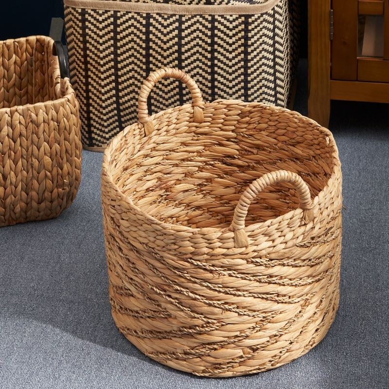 Panier rond tissé en jonc de mer et jacinthe d'eau Isidore pour le rangement de la maison