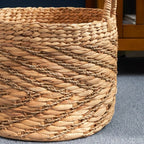 Panier rond tissé en jonc de mer et jacinthe d'eau Isidore pour le rangement de la maison