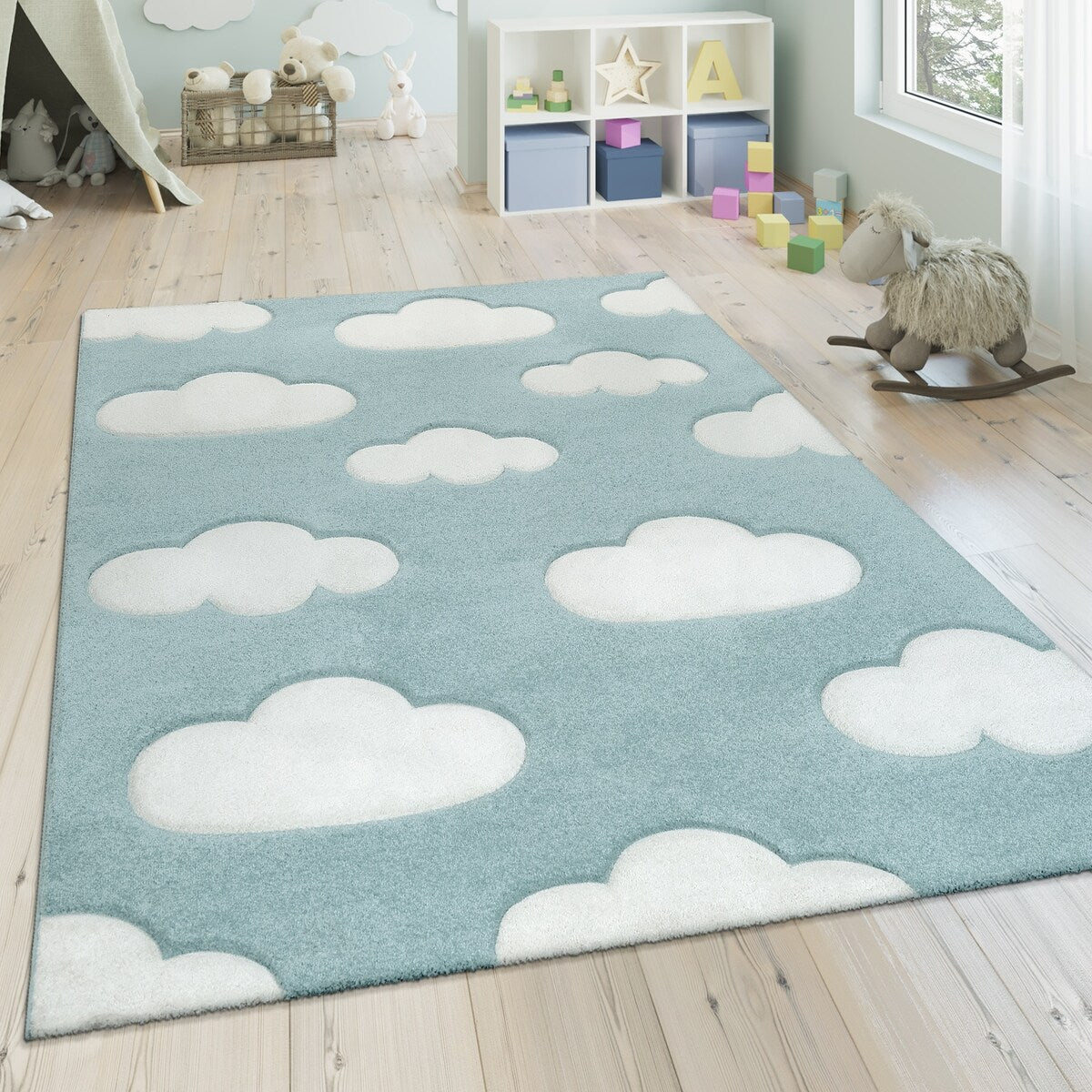 Tapis pour chambre d'enfant ou crèche aux couleurs pastel avec nuages
