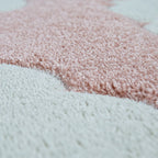 Tapis pour chambre d'enfant ou crèche aux couleurs pastel avec nuages