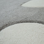 Tapis pour chambre d'enfant ou crèche aux couleurs pastel avec nuages