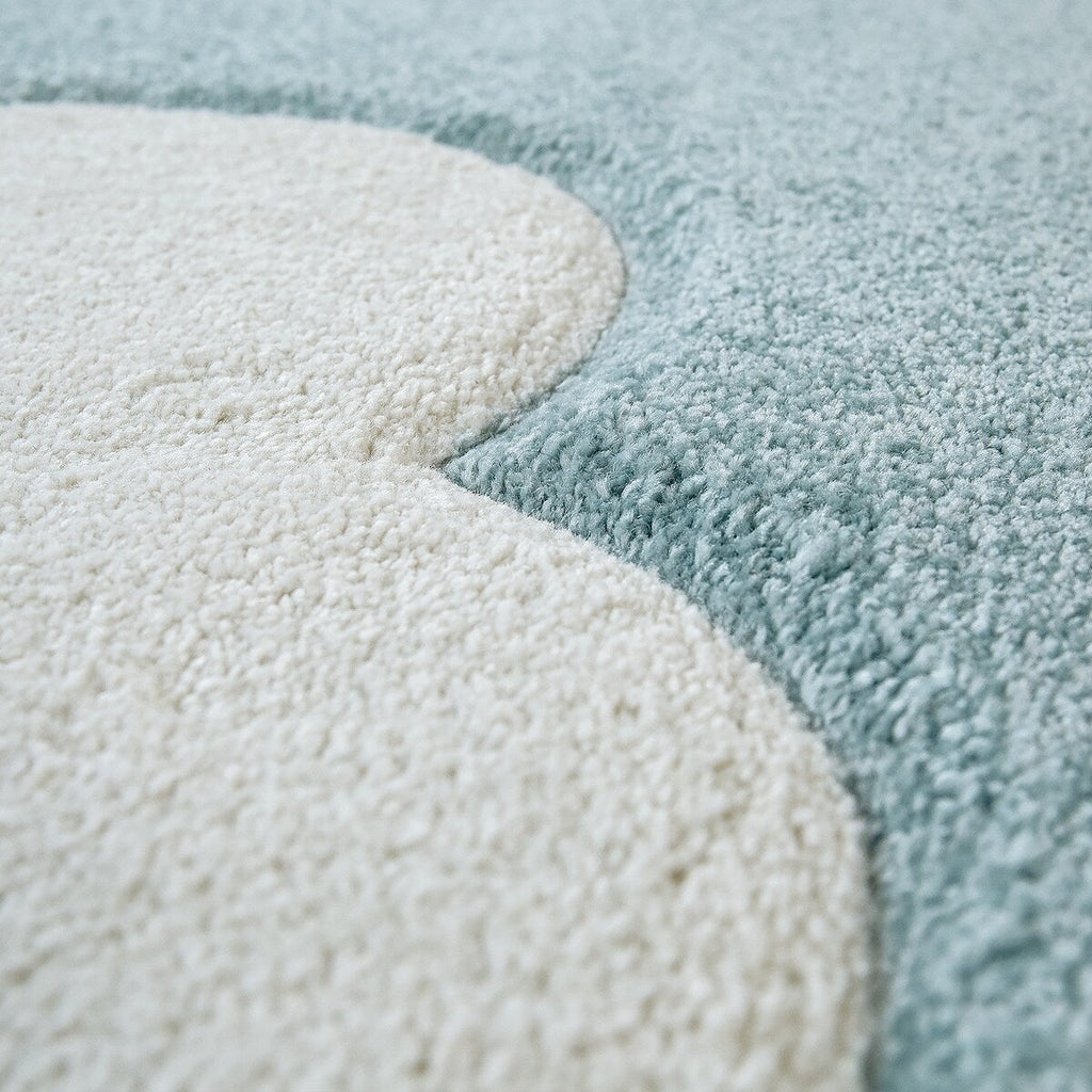 Tapis pour chambre d'enfant ou crèche aux couleurs pastel avec nuages