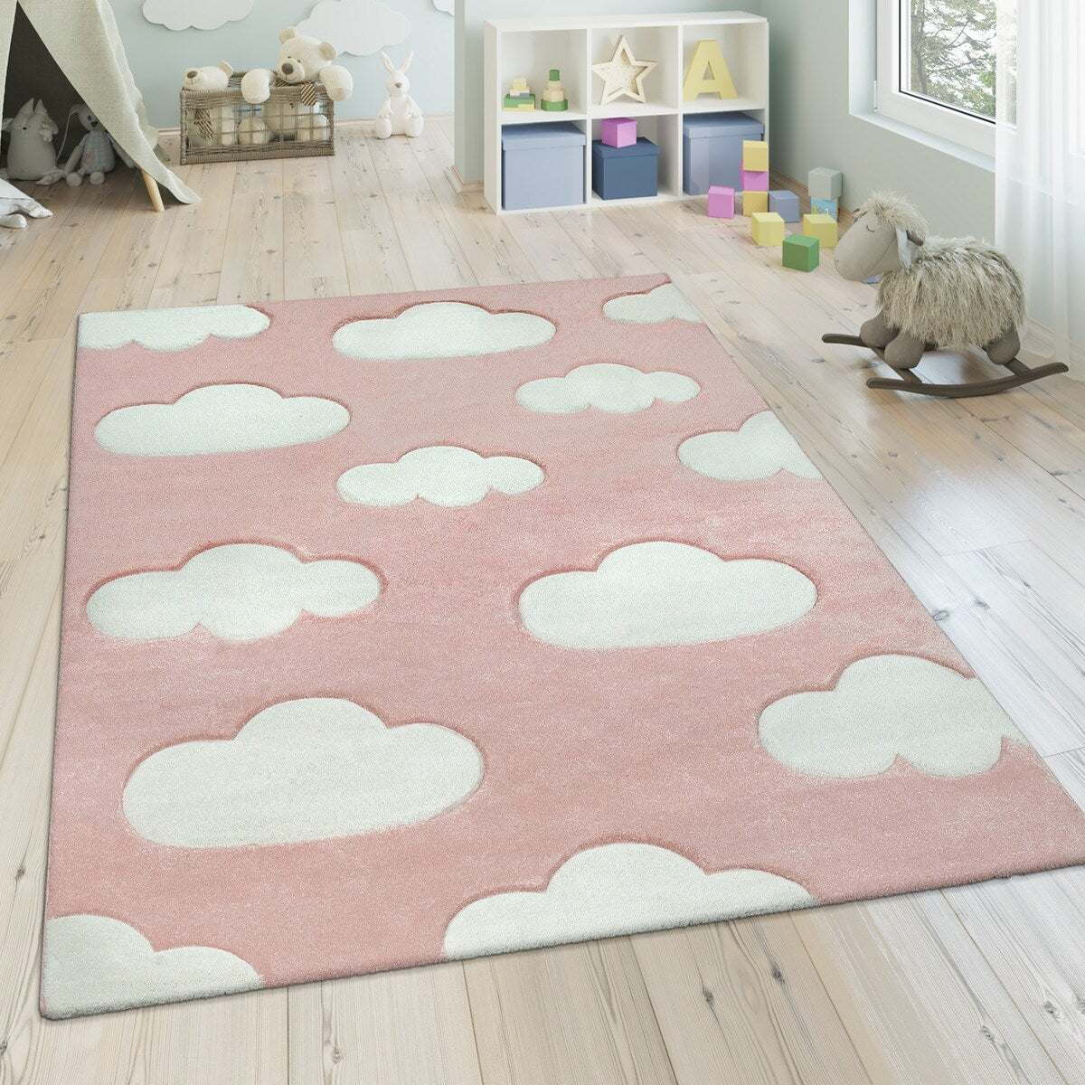 Tapis pour chambre d'enfant ou crèche aux couleurs pastel avec nuages
