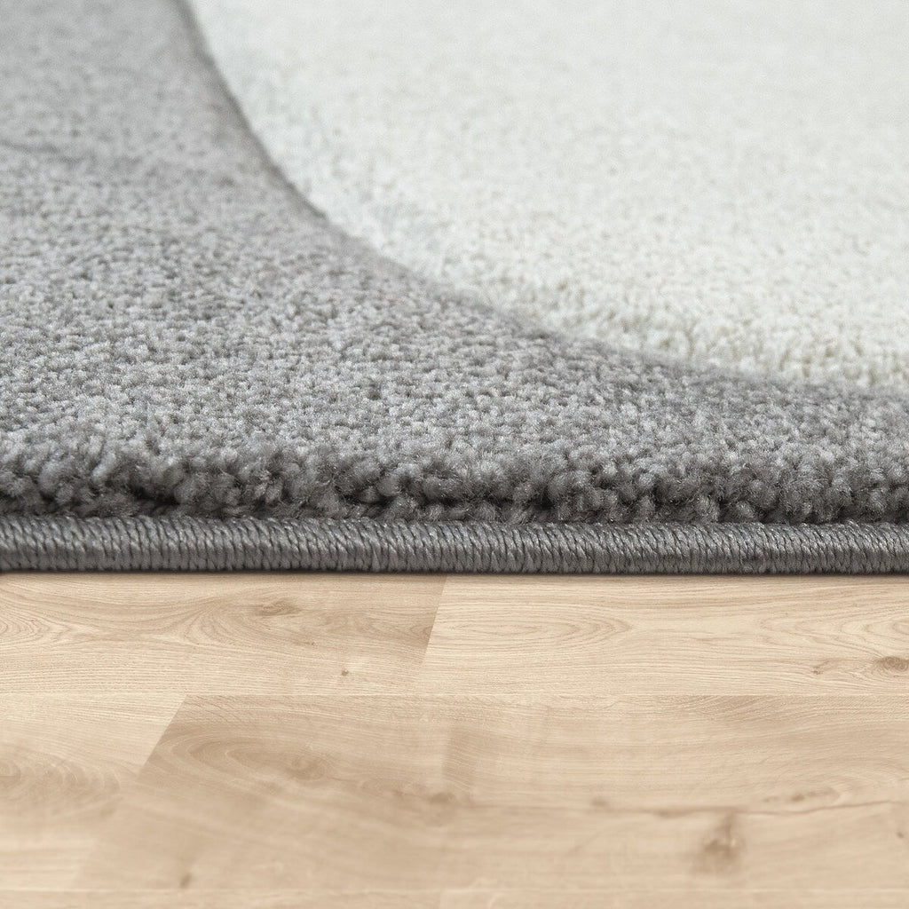 Tapis pour chambre d'enfant ou crèche aux couleurs pastel avec nuages