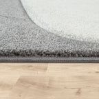 Tapis pour chambre d'enfant ou crèche aux couleurs pastel avec nuages