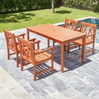 Ensemble de salle à manger de patio Lazarus 5 pièces en bois tropical brun rougeâtre avec table et fauteuils