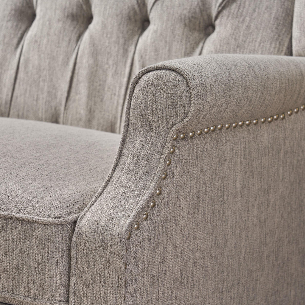Fauteuil inclinable rembourré surdimensionné gris clair avec repose-pieds, dossier capitonné et clous décoratifs
