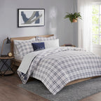 Parure de lit réversible Madison Park Essentials Paton bleu marine avec draps