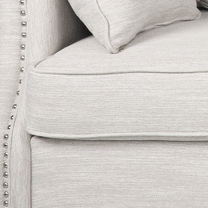 Canapé 3 places en tissu Manbow avec coussins et garniture cloutée par Christopher Knight Home