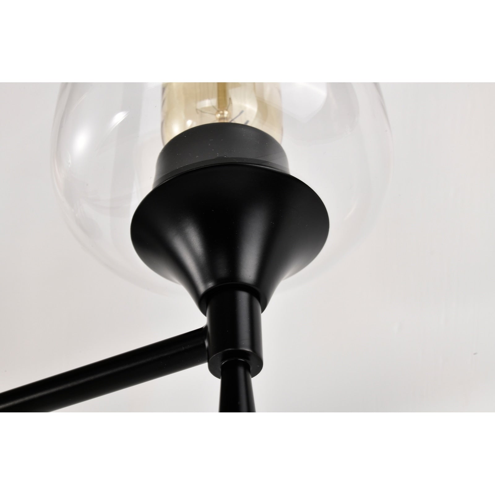 Applique de vanité moderne noir mat à 4 lumières avec abat-jour en verre transparent