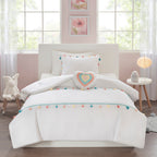 Parure de lit Tanya à pompons et coussin en forme de cœur pour enfants au design intelligent