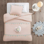 Parure de lit Tanya à pompons et coussin en forme de cœur pour enfants au design intelligent