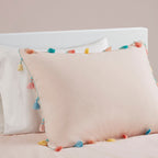 Parure de lit Tanya à pompons et coussin en forme de cœur pour enfants au design intelligent