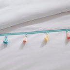 Parure de lit Tanya à pompons et coussin en forme de cœur pour enfants au design intelligent
