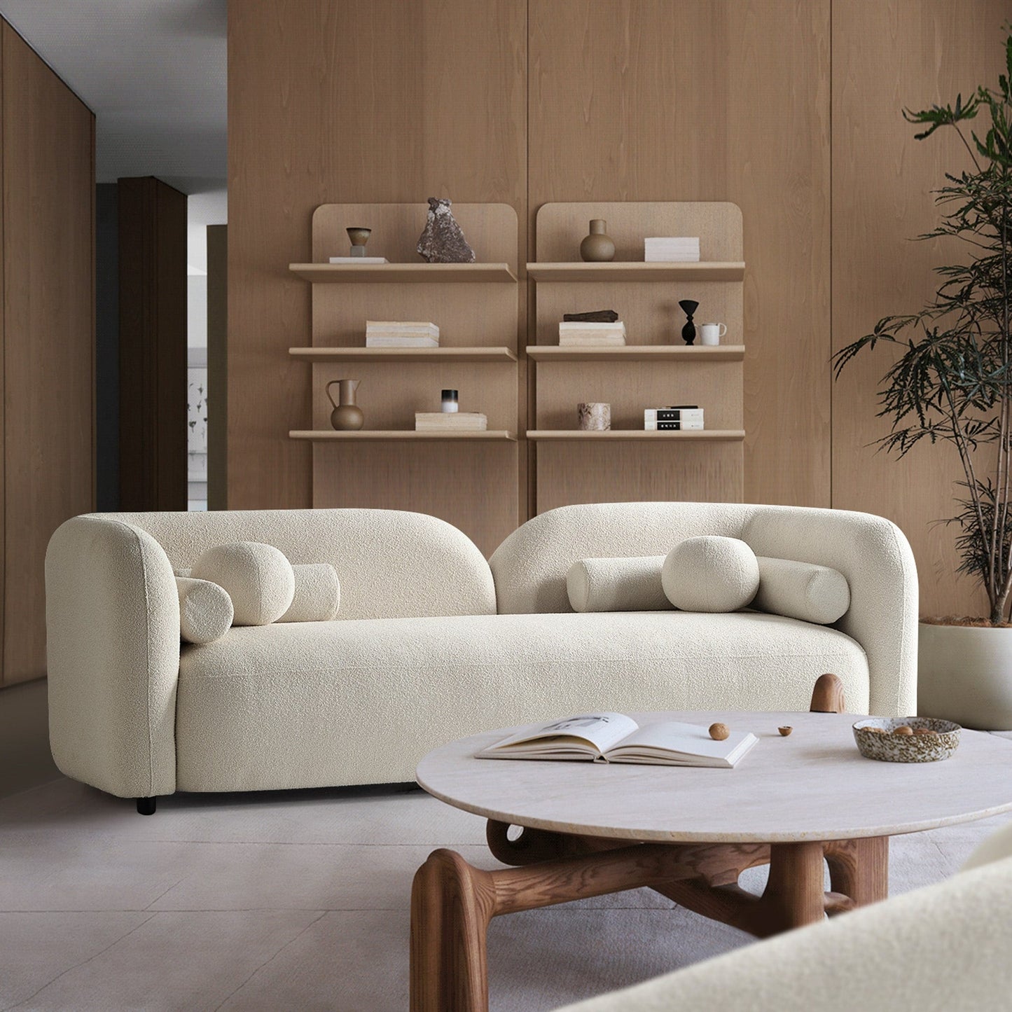 Canapé Milet de luxe moderne en tissu bouclé avec accoudoirs incurvés