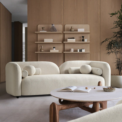 Canapé Milet de luxe moderne en tissu bouclé avec accoudoirs incurvés