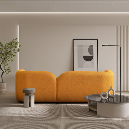 Canapé Milet de luxe moderne en tissu bouclé avec accoudoirs incurvés