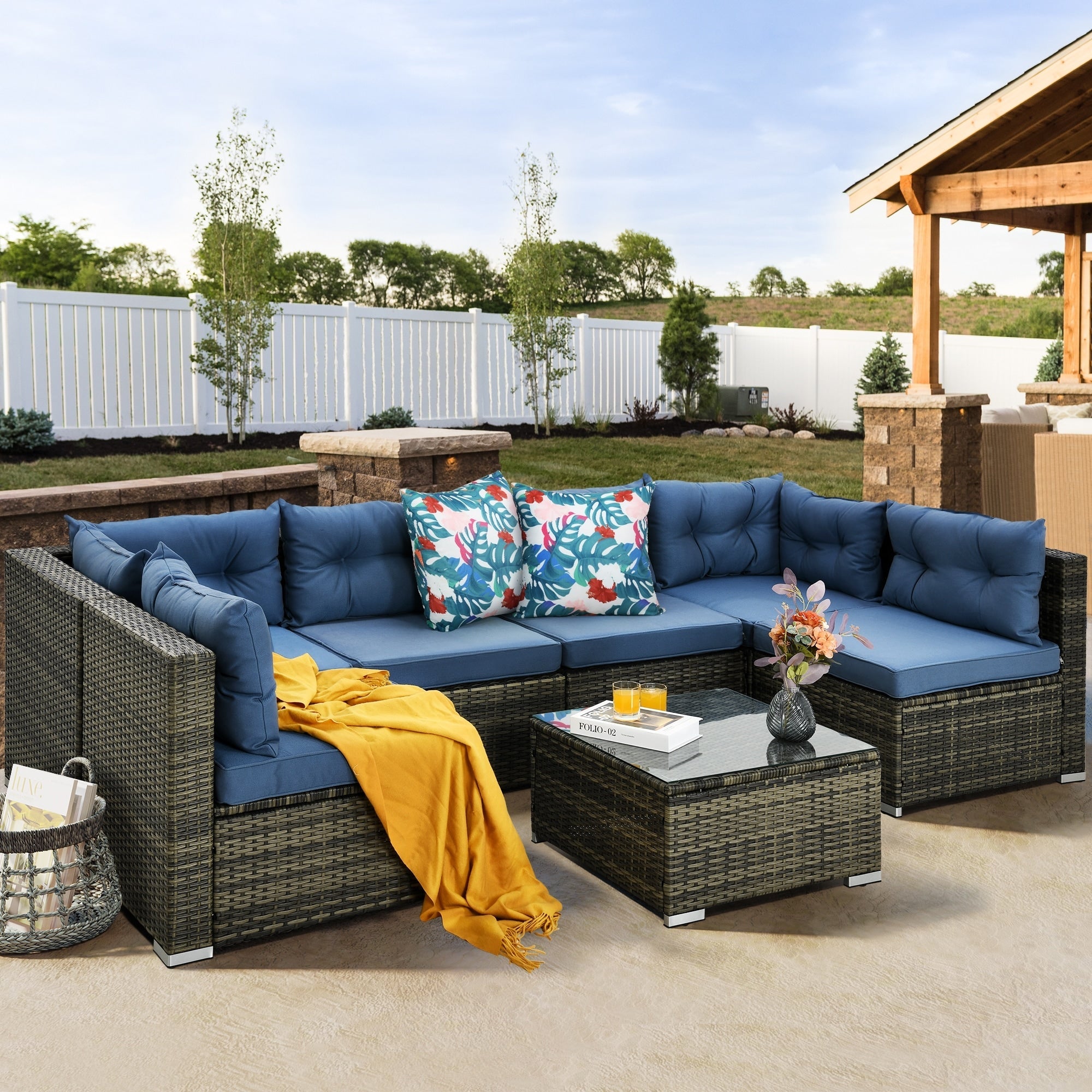 Ensemble de salon de jardin 7 pièces en osier avec canapé sectionnel et table basse et coussins Moasis
