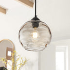 Lampe suspendue moderne noire à 1 lumière avec abat-jour en verre transparent ondulé