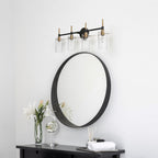 Applique murale moderne de salle de bain noire et dorée à intensité variable avec cylindre en verre transparent