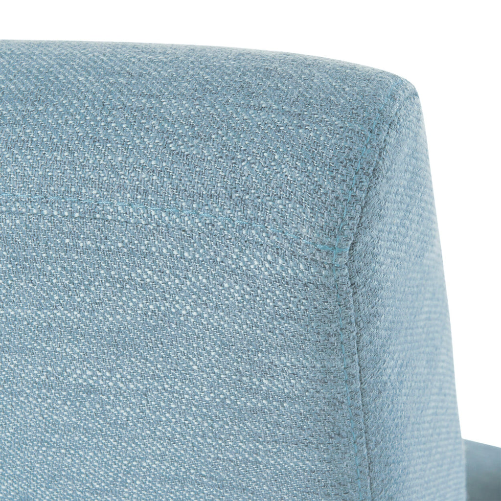 Fauteuil inclinable moderne en tissu avec repose-pieds, détails cloutés et pieds en bois de bouleau