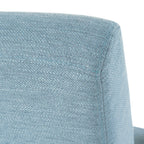 Fauteuil inclinable moderne en tissu avec repose-pieds, détails cloutés et pieds en bois de bouleau